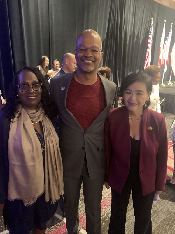 WGAW Board Member Eric Haywood joins Los Angeles County Federation of Labor (AFL-CIO) President Yvonne Wheeler and Congressmember Judy Chu at the Los Angeles County Democratic Party event in Hollywood, CA.  